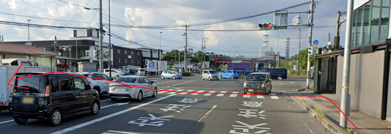 すぐの信号の横断歩道を渡って、左方向に進みます。